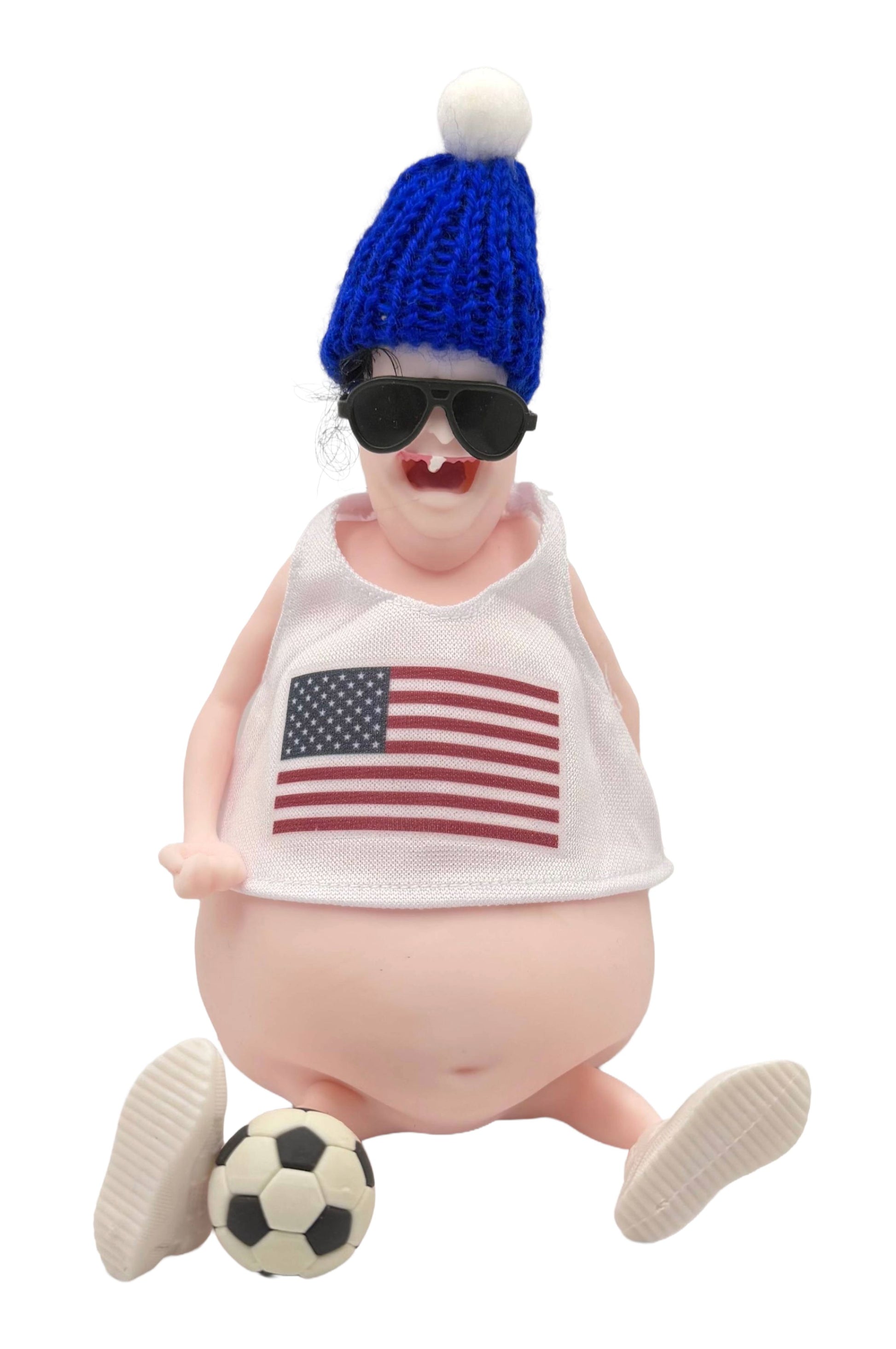 Figurine of a Toy wearing sunglasses, American flag shirt, and blue beanie with a soccer ball on a white background